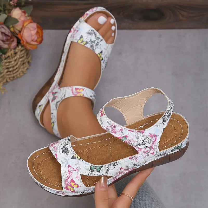 Women's sandals with straps fastened with Velcro and open toes