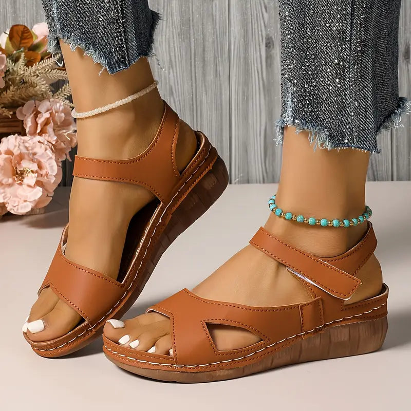 Women's sandals with straps fastened with Velcro and open toes