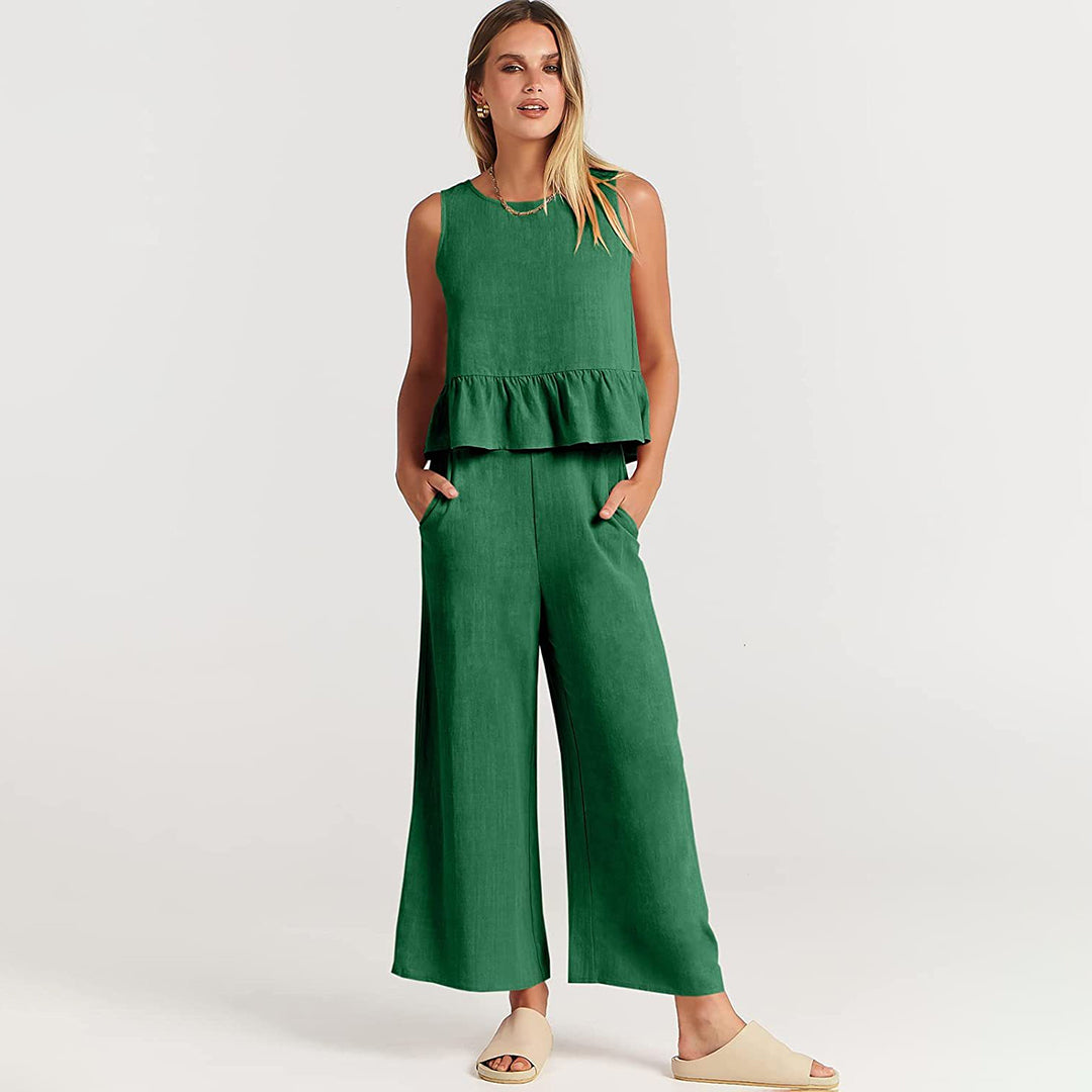 Wide women's trousers and women's blouse with ruffle