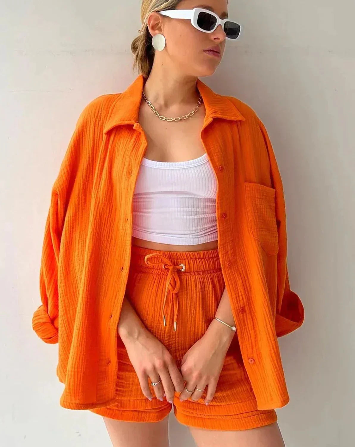 Women's complete set: shirt and shorts with a loose fit