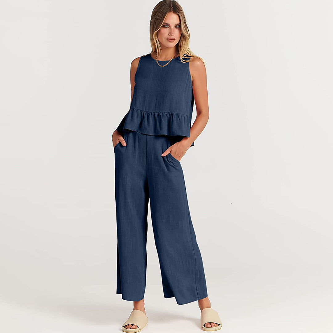 Wide women's trousers and women's blouse with ruffle