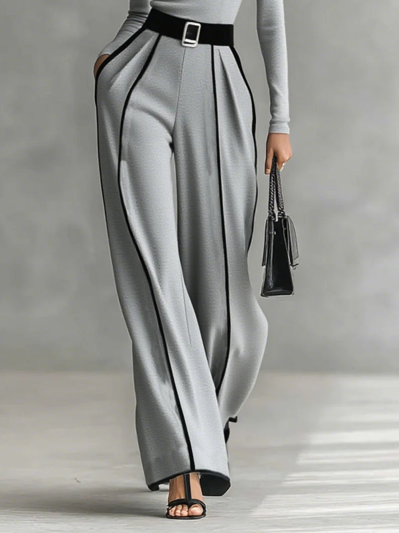 Set consisting of a turtleneck long-sleeve blouse with white accents, wide trousers, and a belt