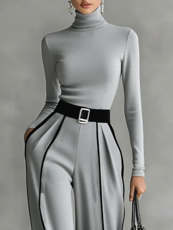 Set consisting of a turtleneck long-sleeve blouse with white accents, wide trousers, and a belt