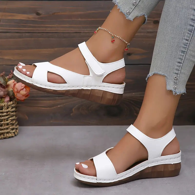 Women's sandals with straps fastened with Velcro and open toes