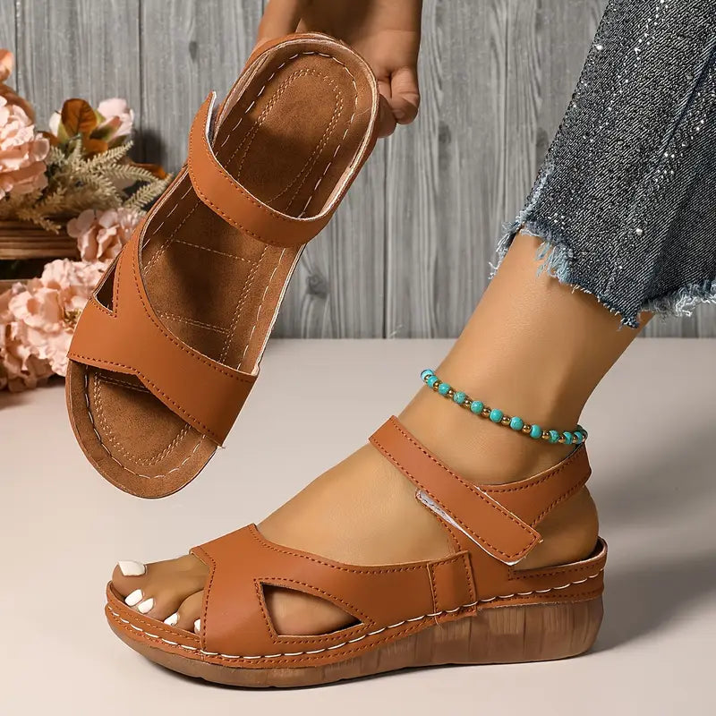 Women's sandals with straps fastened with Velcro and open toes